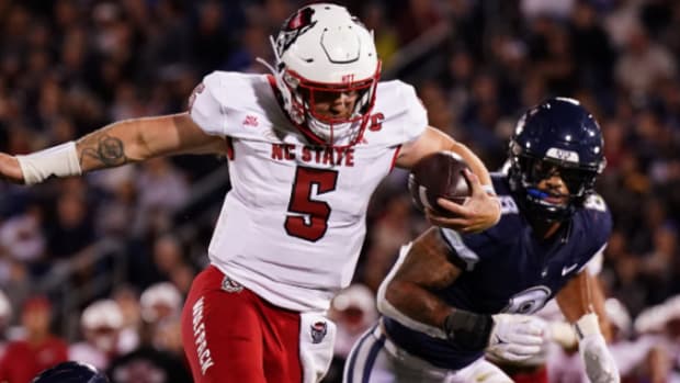 NC State Wolfpack quarterback Brennan Armstrong on a carry during a college football game on the ACC schedule.